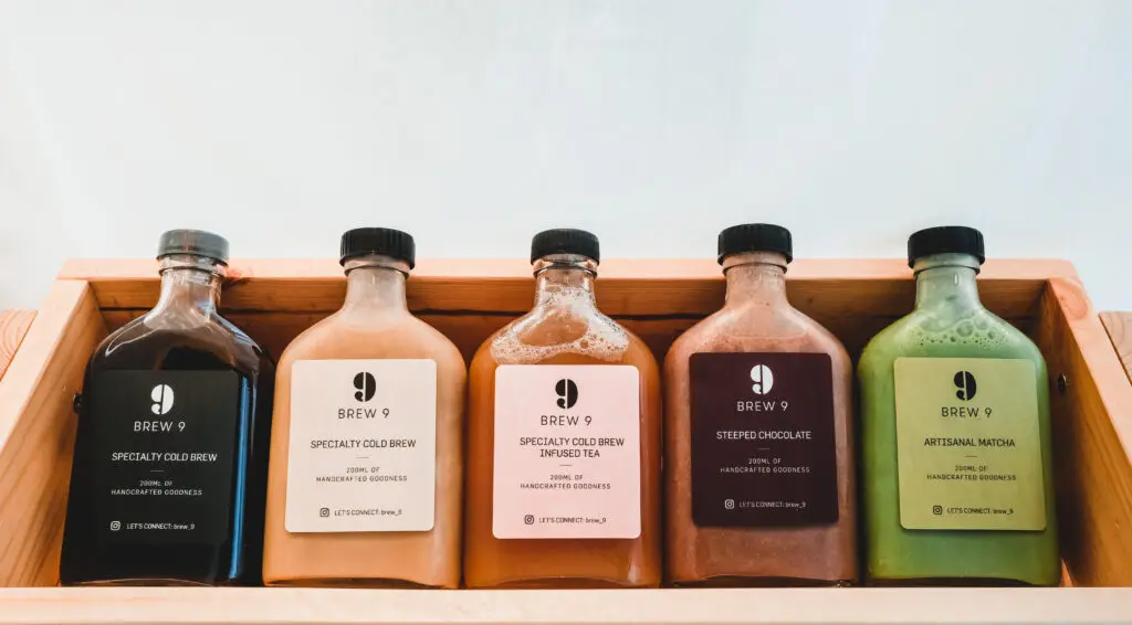 cold brew coffee and non coffee drinks in classy hipster glass bottles